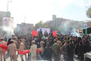 شرکت در مراسم تشییع پیکر شهدای مدافع حرم استان همدان